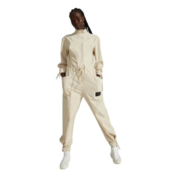 Sweaty Betty x Halle Berry NEW Jackie Jumpsuit Beige Size Medium Re Spin Edit - Picture 1 of 10